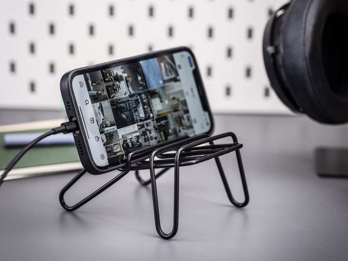 A black KRUBBET holder for mobile phone