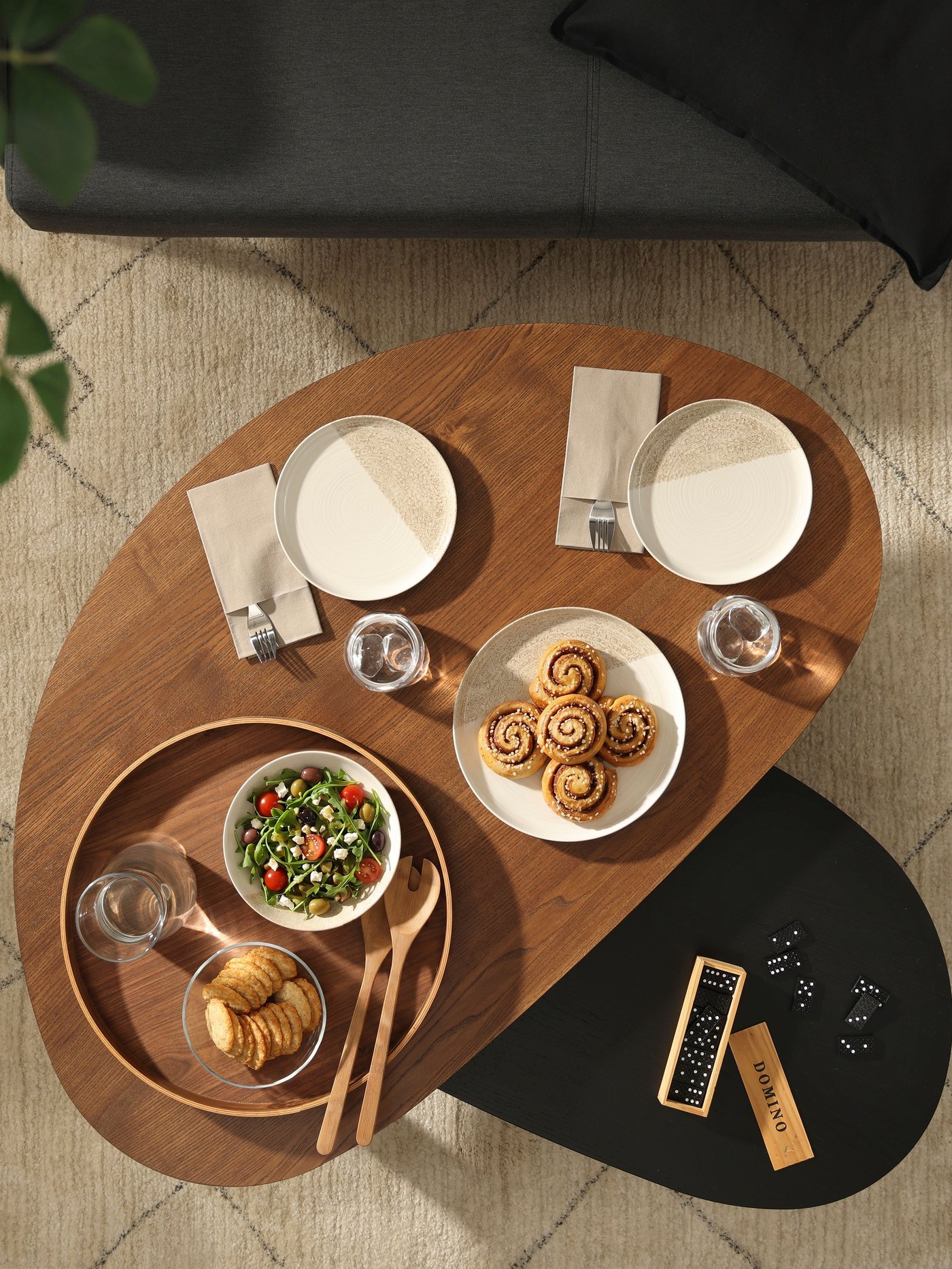 A brown/black ash veneer ÖRTRÄSK nest of tables in the living room