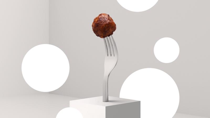 40-vuotta täyttävä designklassikko IKEA-lihapyörykkä valkoisen pedestaalin päällä.