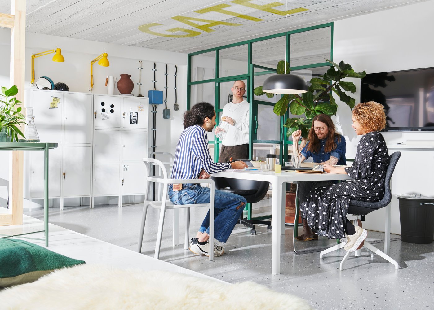 A light grey YPPERLIG chair with armrests, in/outdoor
