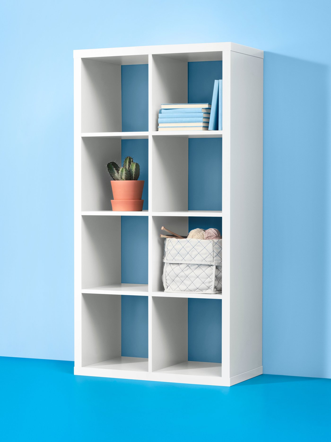 A white KALLAX shelving unit