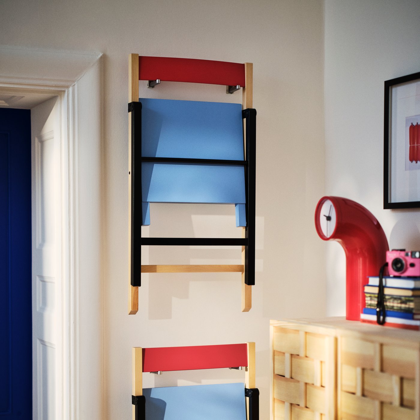 IKEA PS 2026 foldable chairs and red clock