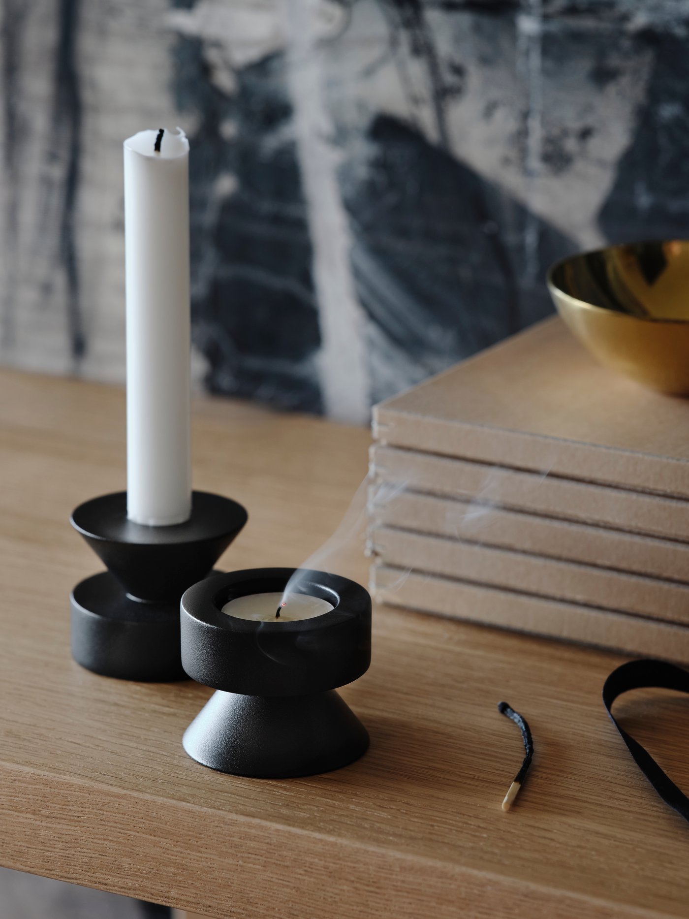 A white JUBLA unscented tealight