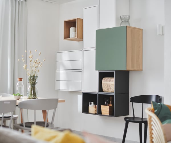 A white EKET cabinet with 2 drawers in the dining room