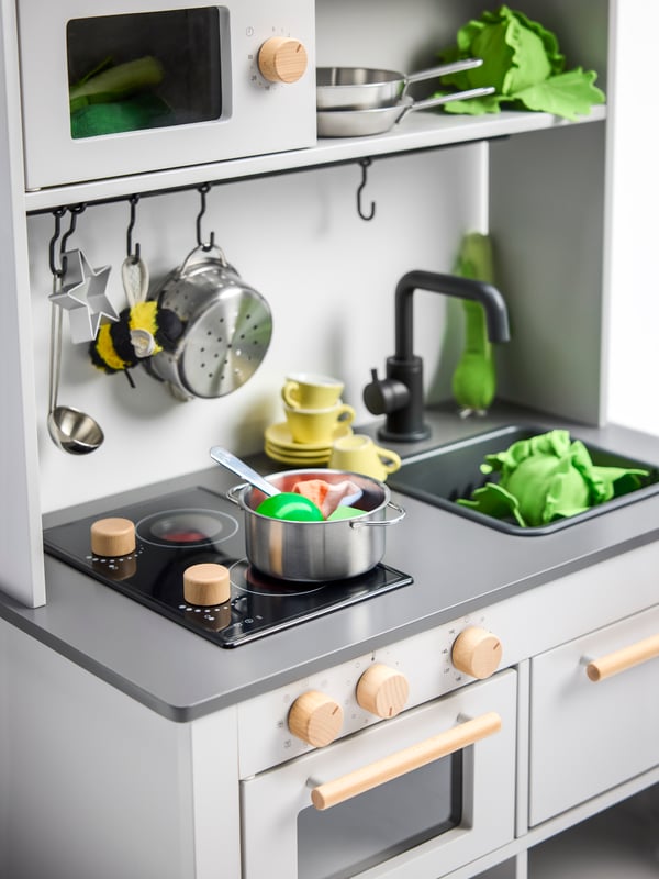 A multicolour DUKTIG 5-piece toy kitchen utensil set