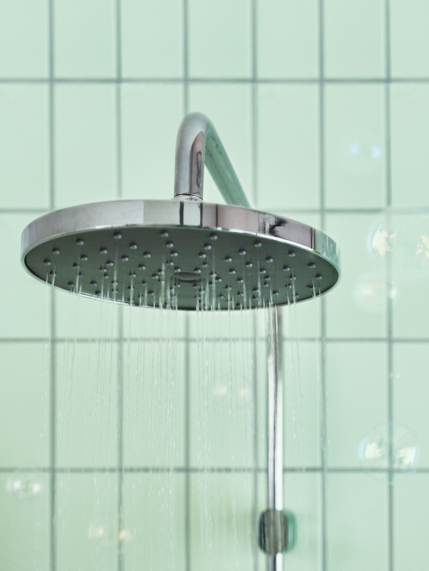 A chrome-plated BROGRUND head/handshower kit with diverter