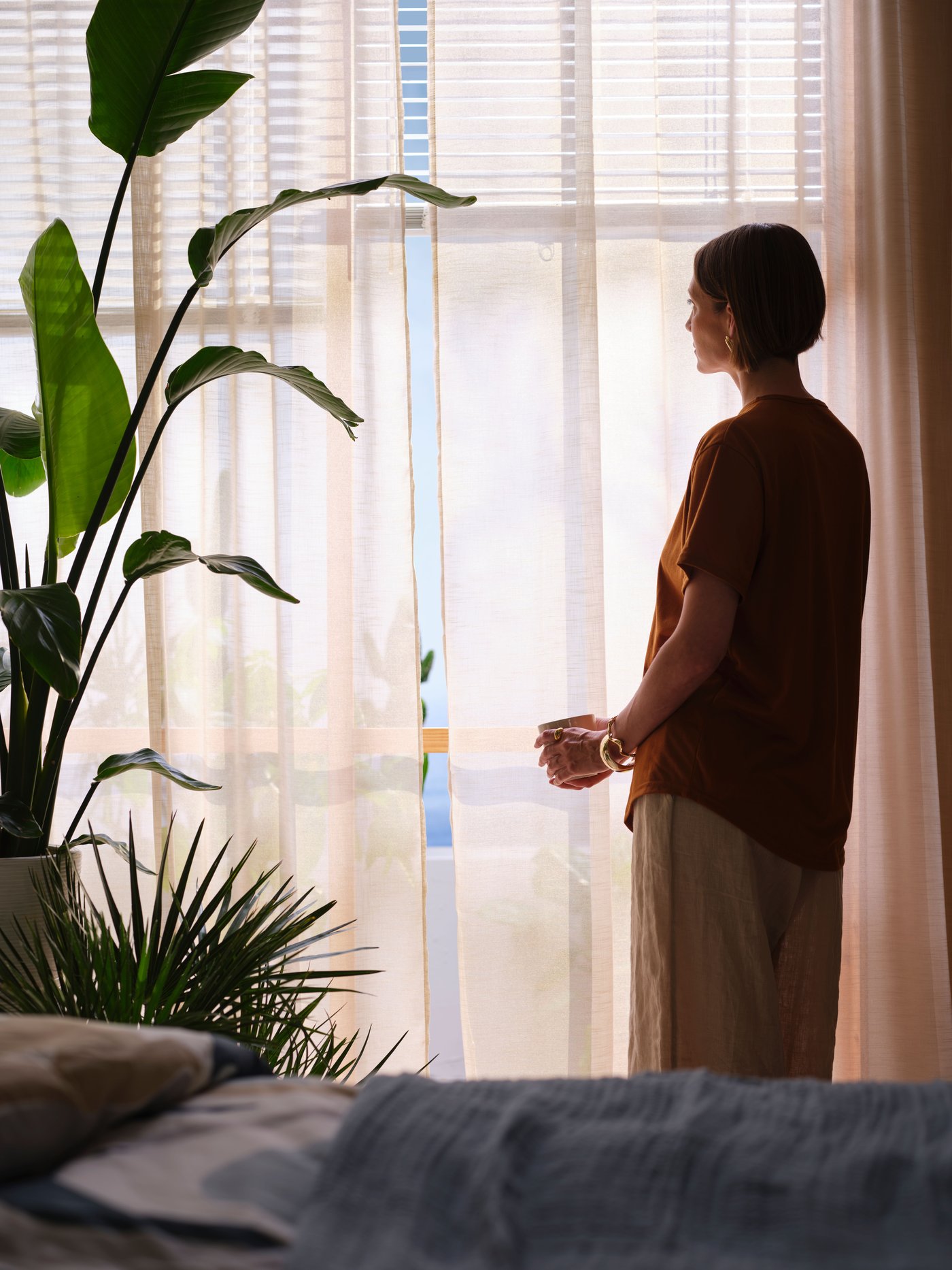 A light beige/with heading tape HÄLLEBRÄCKA sheer curtains, 1 pair