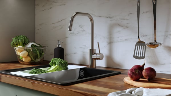 ÄLMAREN faucet and KILSVIKEN sink built in on KARLBY butcher block countertop.