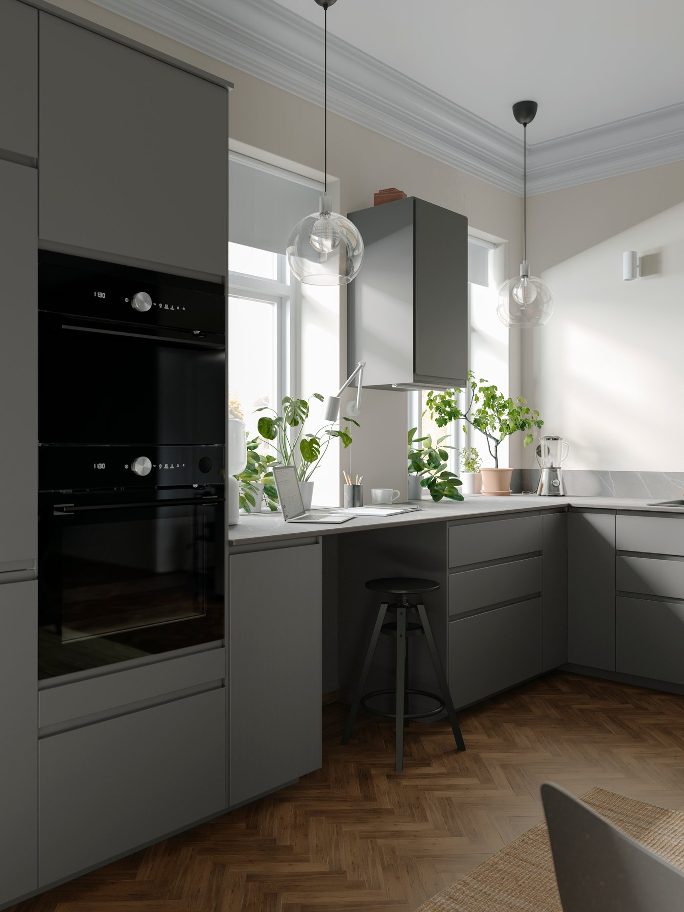 A dark grey VOXTORP kitchen with smooth fronts IKEA