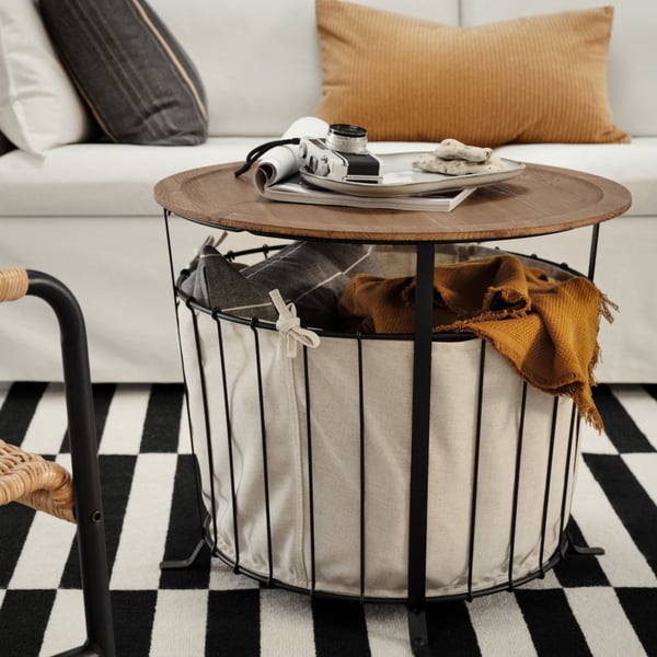 A black/pine light brown stained ÄNGESBYN storage table