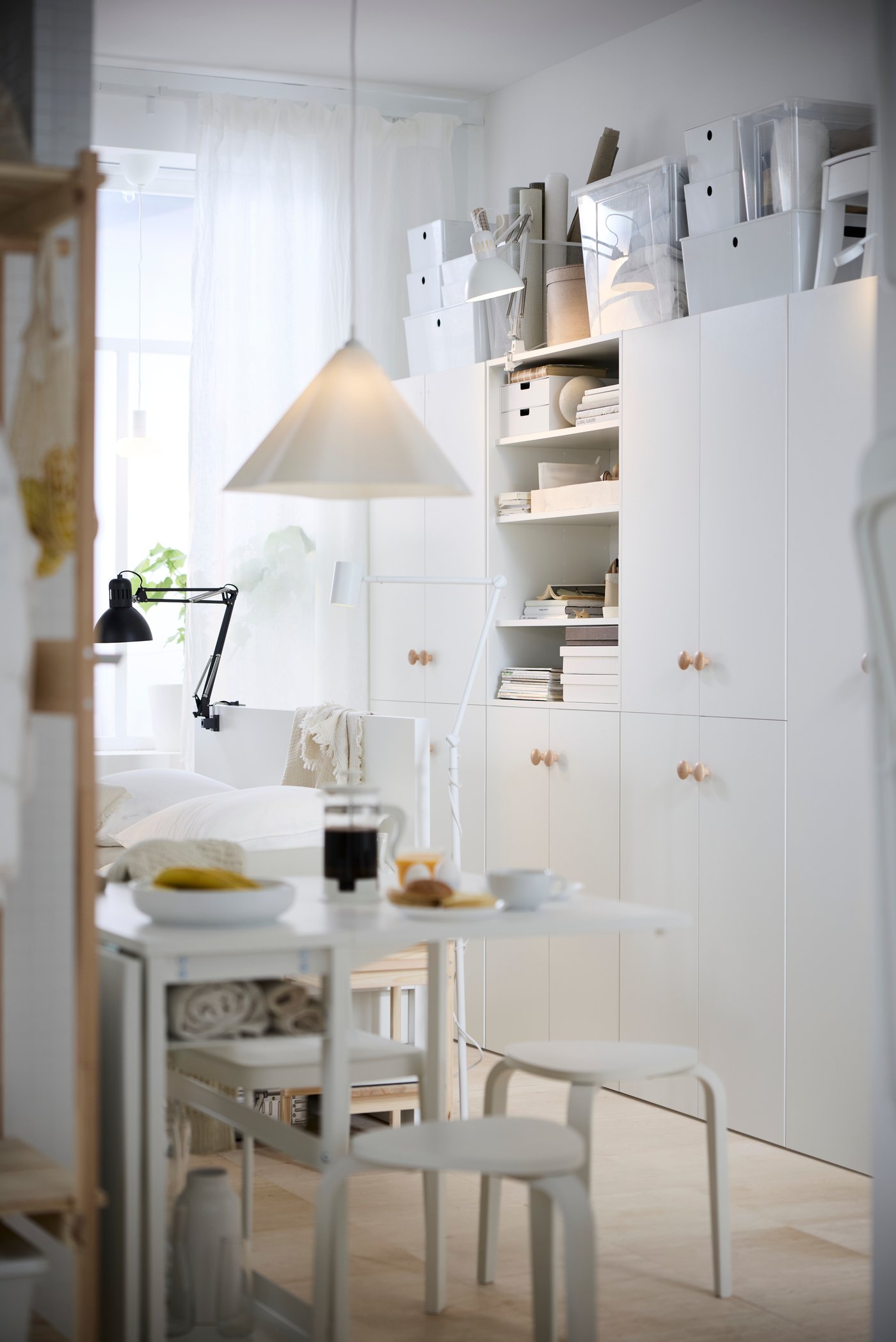 A dark grey TERTIAL work lamp in the bedroom