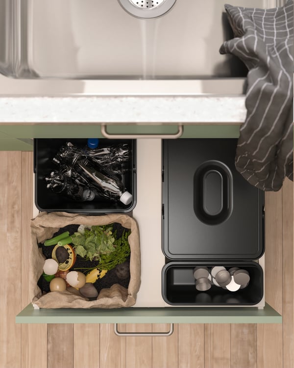 A black IKEA 365+ tea towel in the kitchen