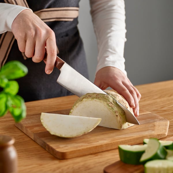 A stainless steel/walnut VARDAGEN cook's knife