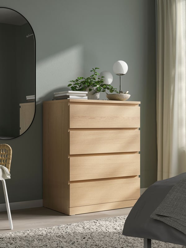 A white stained oak veneer MALM chest of 4 drawers