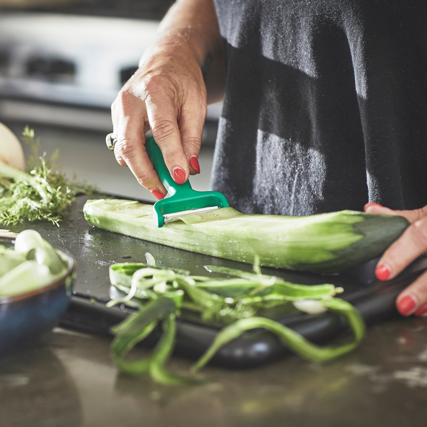 A bright green UPPFYLLD peeler