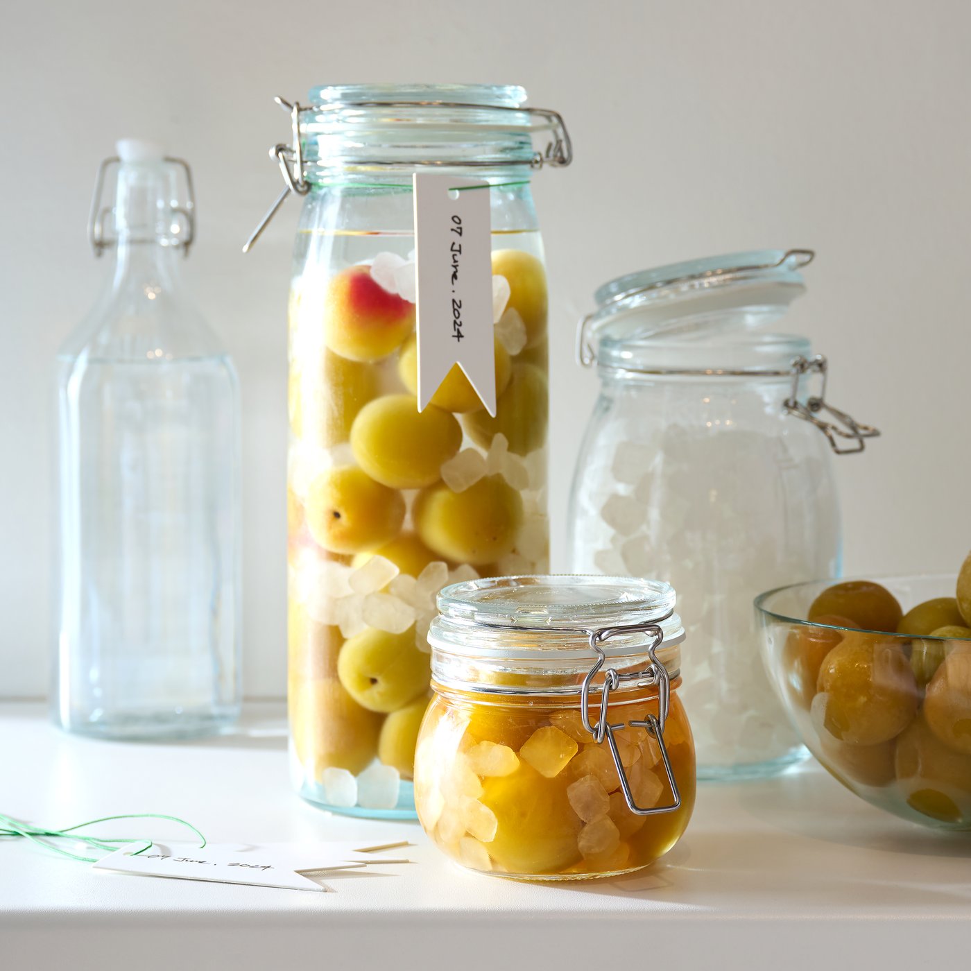 A clear glass KORKEN jar with lid
