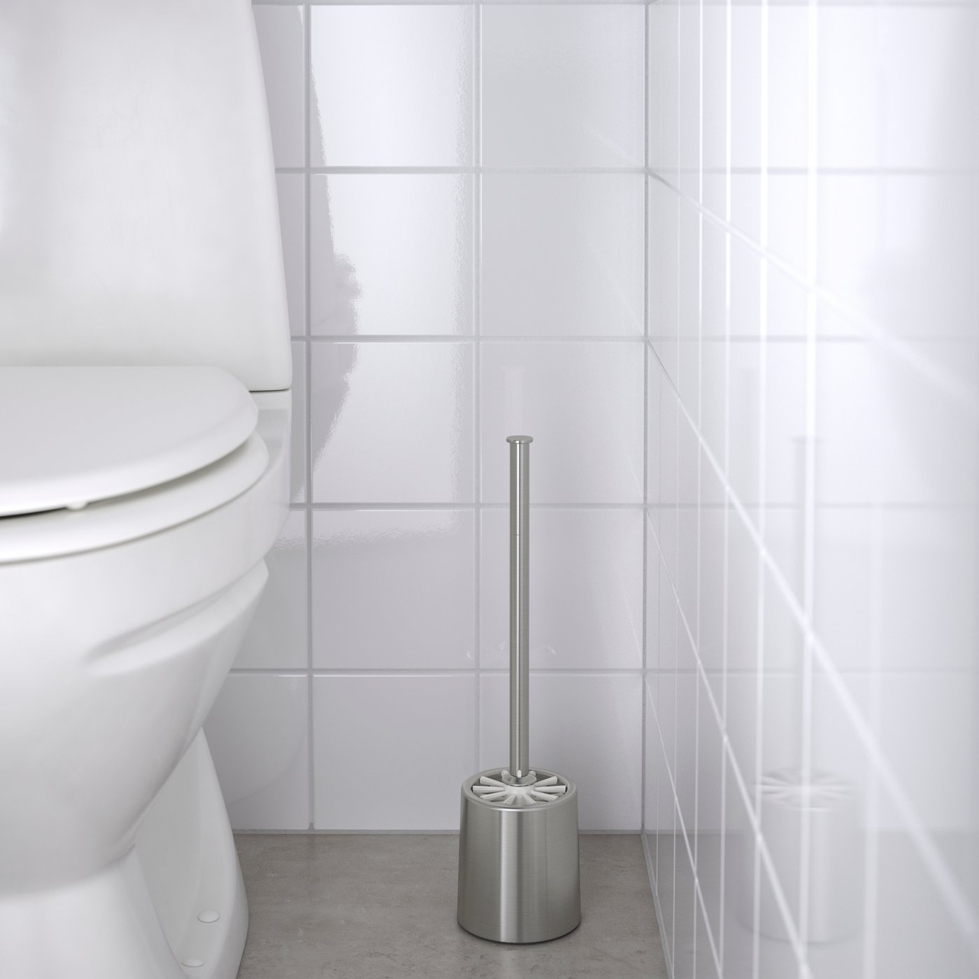 A stainless steel BROGRUND toilet brush