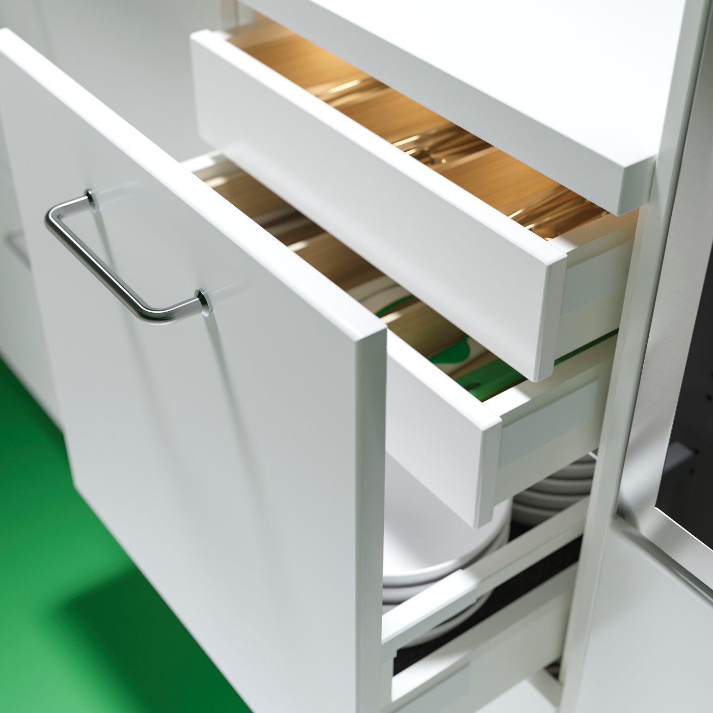 Un cassetto in un mobile base METOD è aperto e mostra altri cassetti interni nascosti dietro il frontale da cucina.