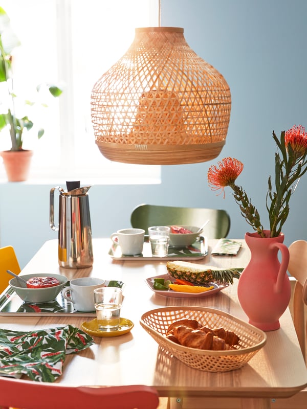 A multicolour SOMMARLIV paper napkin in the dining room on a LISABO dining table