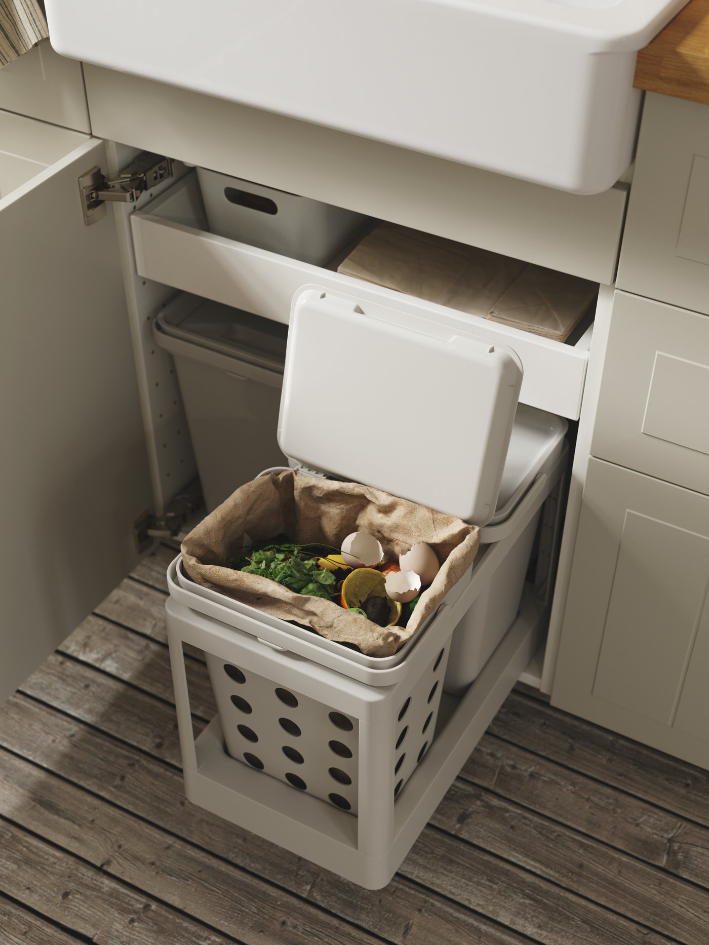 Basureros para reciclar HÅLLBAR con una bolsa en su interior de basura.