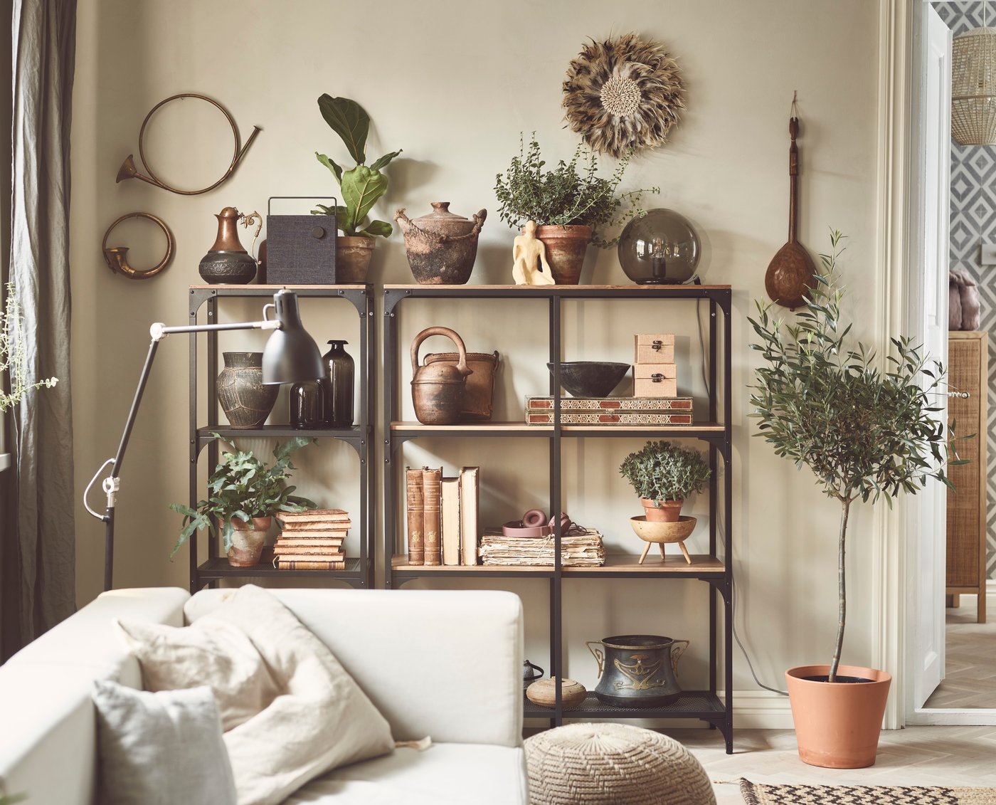 A black FJÄLLBO shelving unit