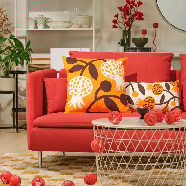 A pomegranate/orange FÖSSTA cushion