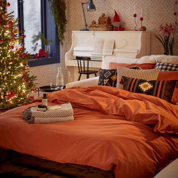 A goat red VINTERFINT decoration in the living room