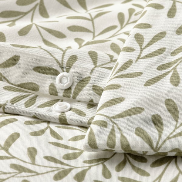 A white/green SORGMANTEL duvet cover and pillowcase