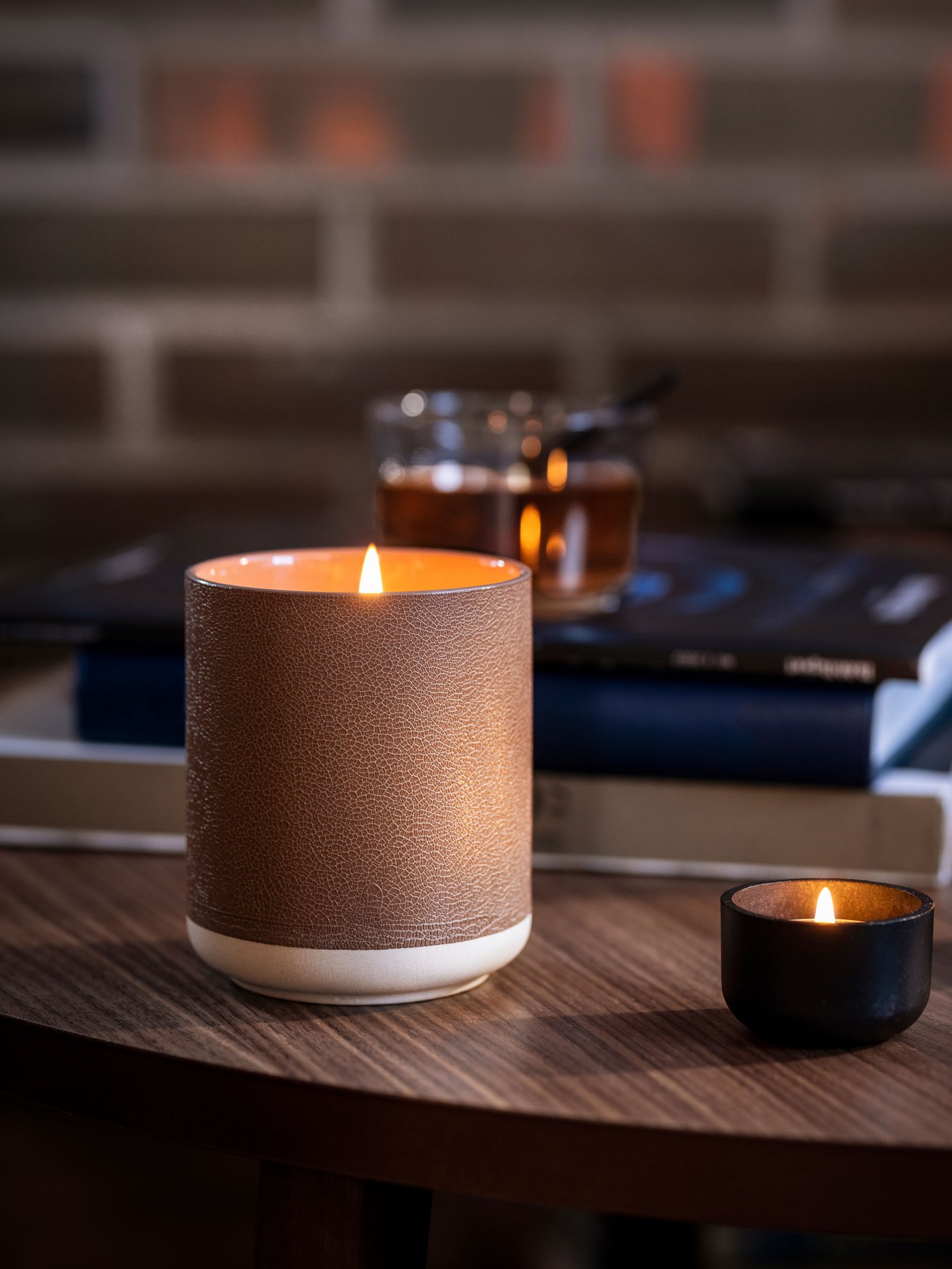 A black HEDERVÄRD tealight holder