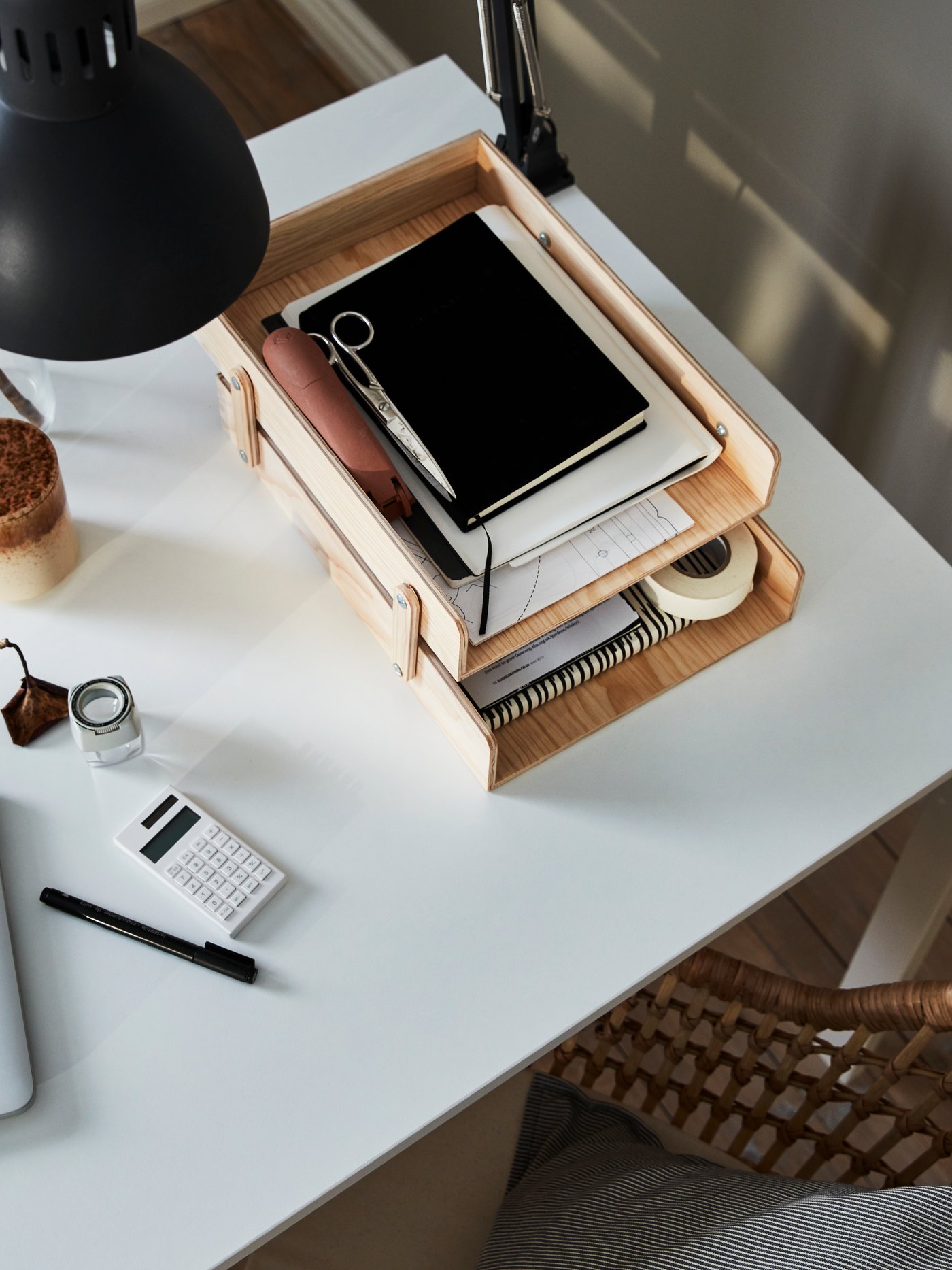 A dark grey TERTIAL work lamp in the living room