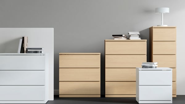 An oak effect STORKLINTA chest of 5 drawers in the NA