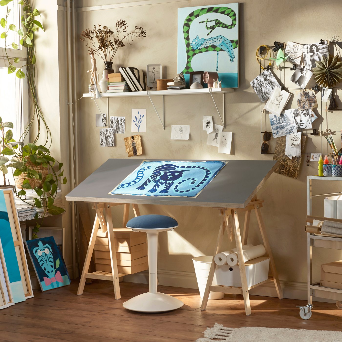 A grey/wood effect birch LAGKAPTEN desk