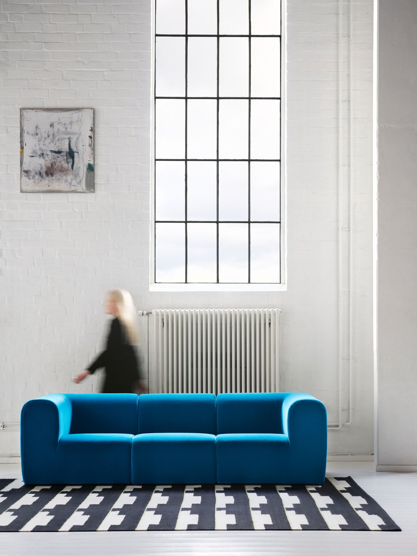 A black/white/light green handwoven STOCKHOLM 2025 rug, flatwoven