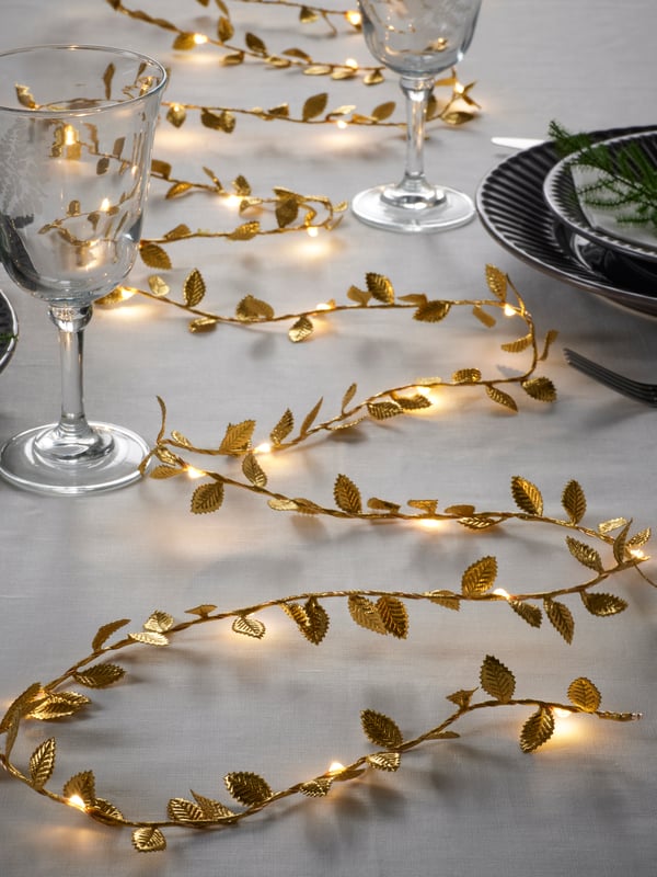 Garlandes de llums de decoració per a la taula de Cap d'Any 