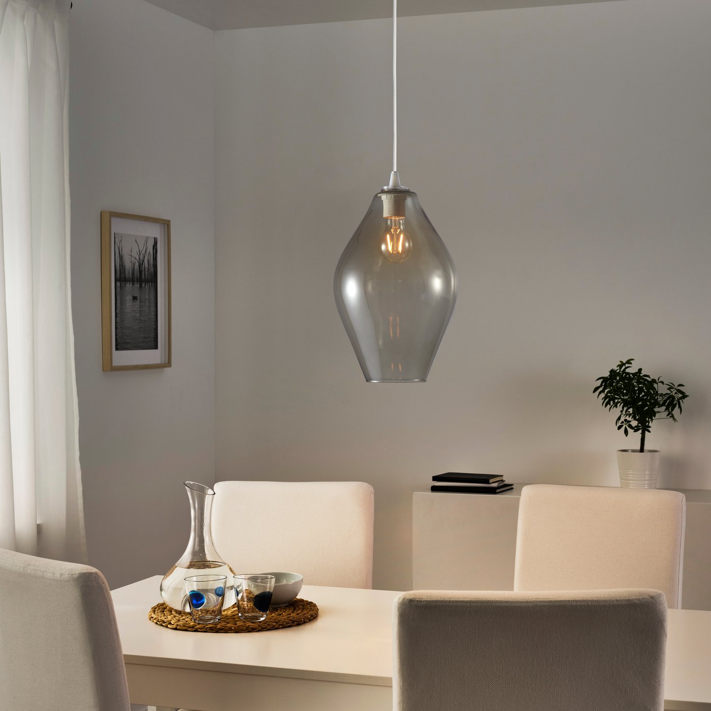 A grey HOLMEJA pendant lampshade