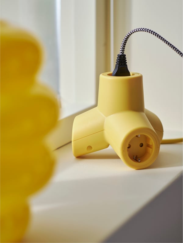 An yellow HORNFELS extension cord