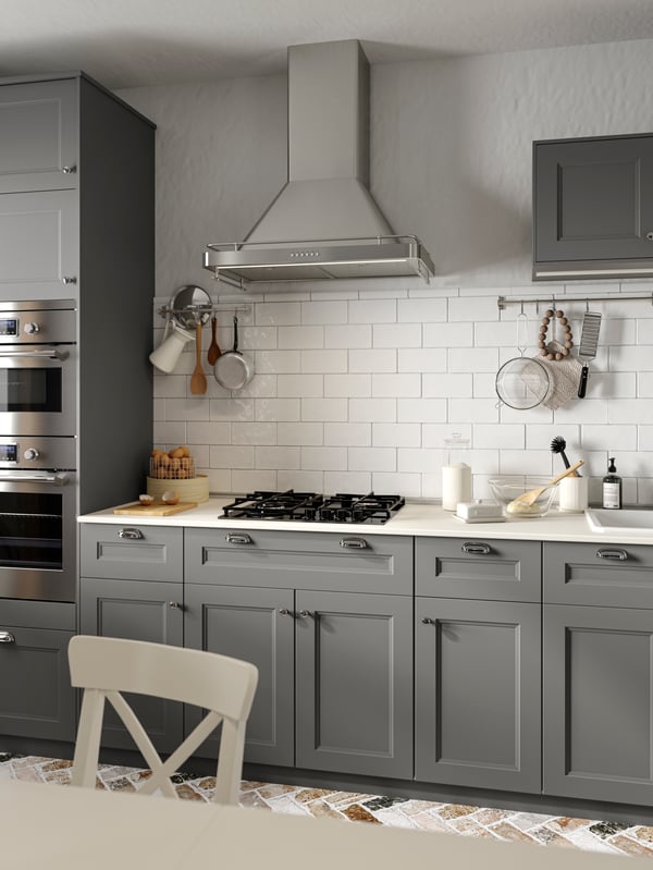 A kitchen featuring gray AXSTAD cabinet doors