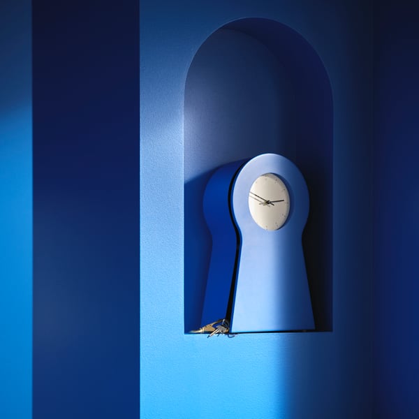 A blue IKEA PS 1995 clock
