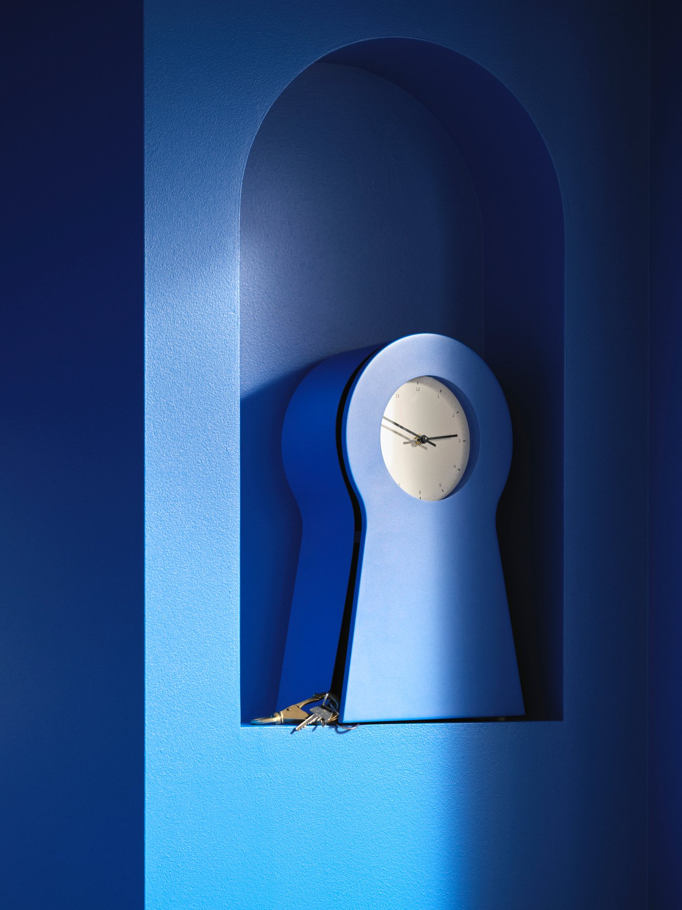 A blue IKEA PS 1995 clock