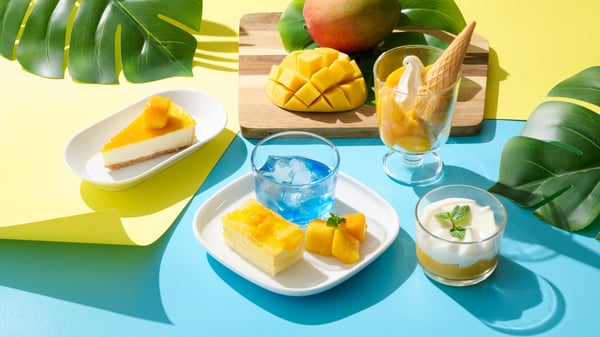 A colorful summer dessert plate with mango treats