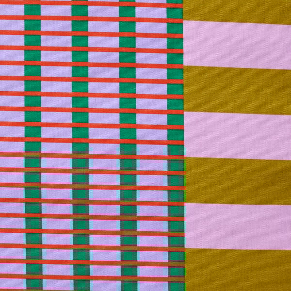 The TESAMMANS pre-cut fabric has a colourful pattern of stripes with different widths in pink, beige, green, red and purple.