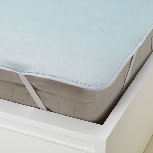 A light blue HÅRGINST mattress protector