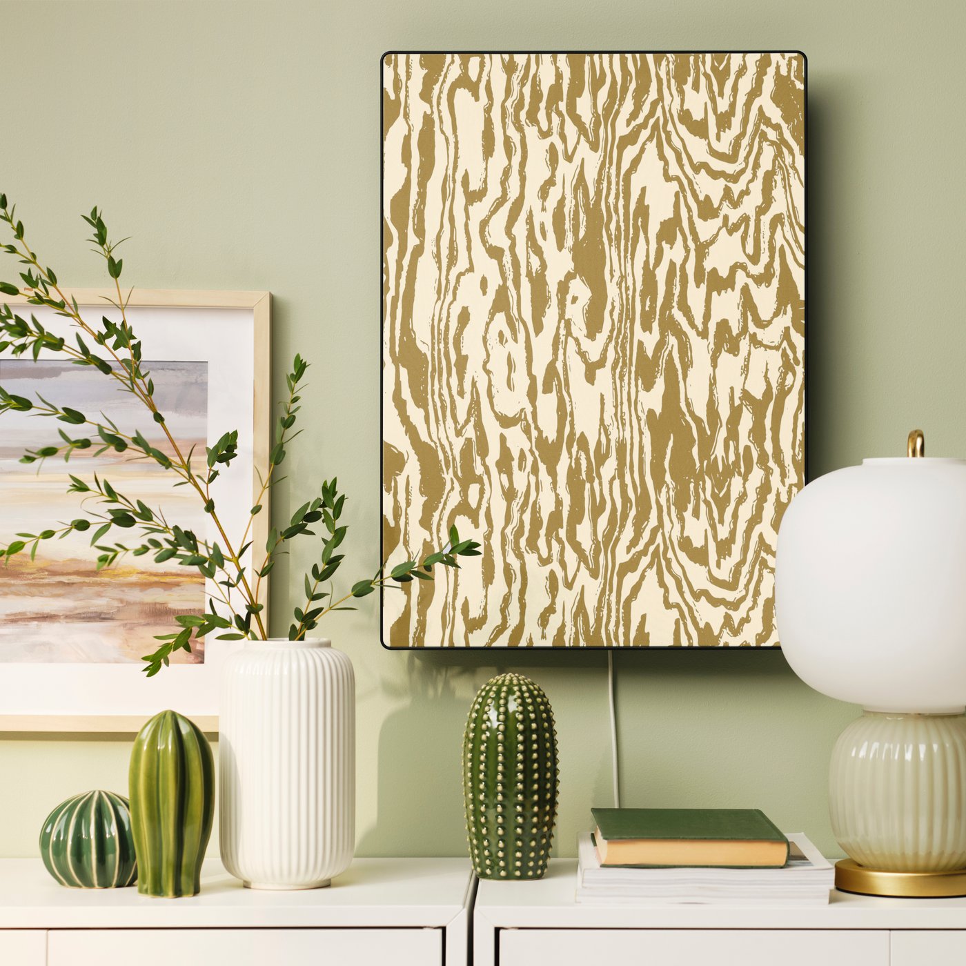 A wood grain SYMFONISK panel for picture frame speaker in the living room