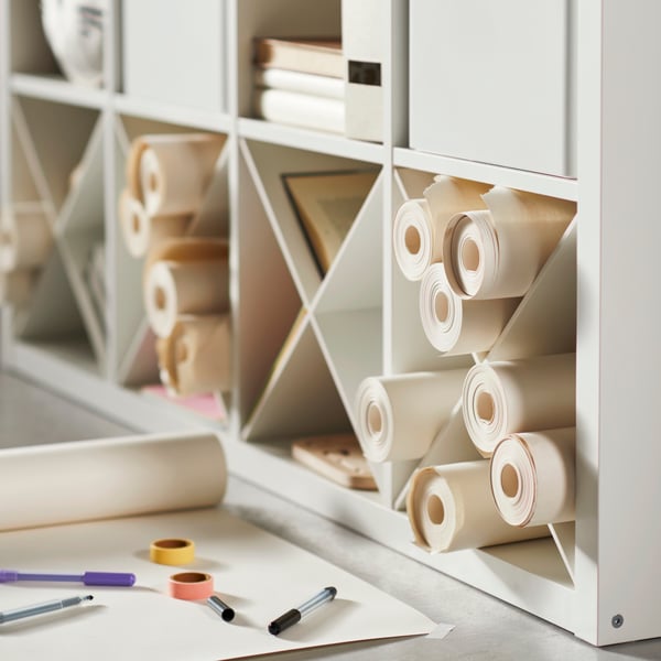 KALLAX insert with compartments for storage of craft materials. 