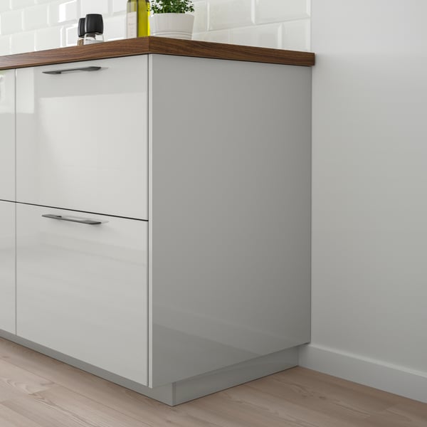 A high-gloss light grey RINGHULT cover panel
