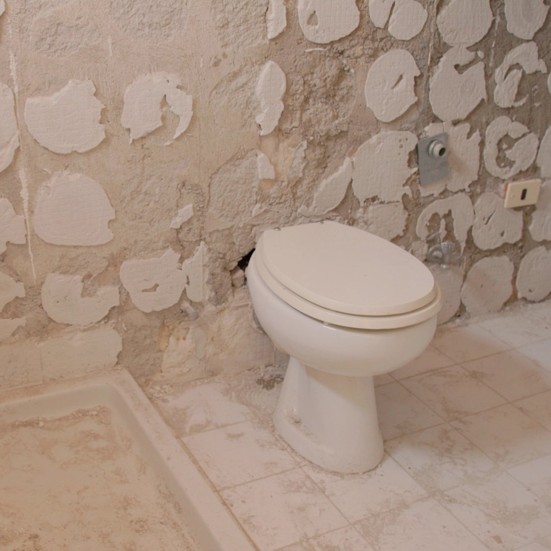 Et før-bilde av badet i Dolce Villa.