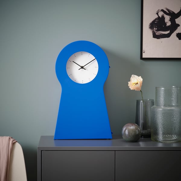 A blue IKEA PS 1995 clock