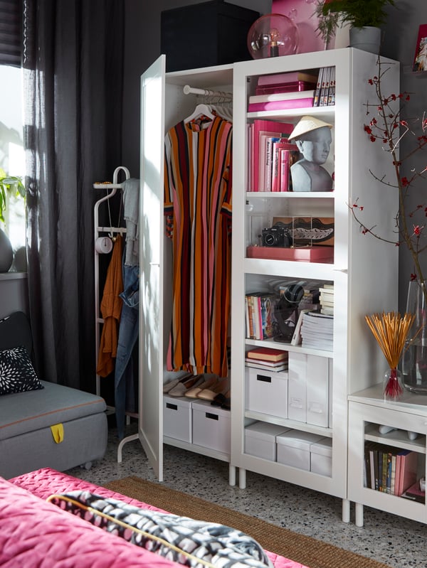 A white IKEA PLATSA media storage combination with closed doors, glass doors, and a TV-bench for a flexible storage solution.