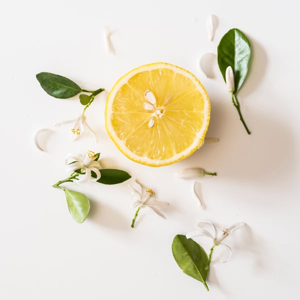 A Citrus flower light yellow LOTSFÅGEL scented candle in glass