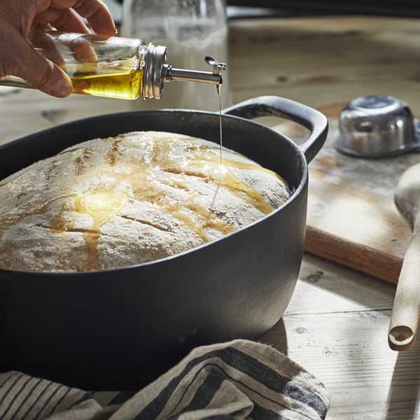 An enamelled cast iron matt/black VARDAGEN casserole with lid